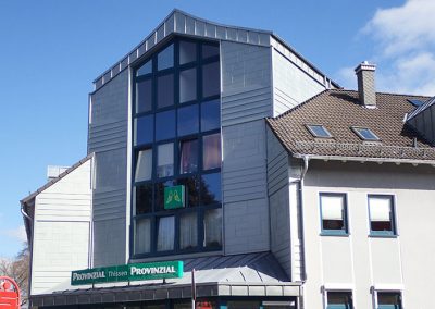 Fassadensanierung an einem Wohn- und Geschäftshaus
